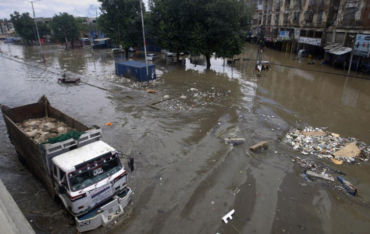 A truck drives through a flooded road after a heavy rainfall in Karachi, Pakistan, Monday, July 11, 2022.  AP/RSS Photo
