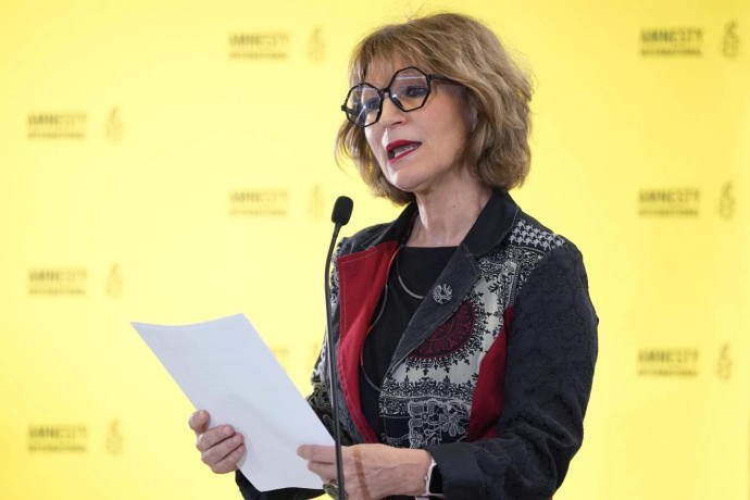 FILE - Agnès Callamard, Secretary General of Amnesty International, speaks at a press conference in London, April 23, 2024. (AP Photo)