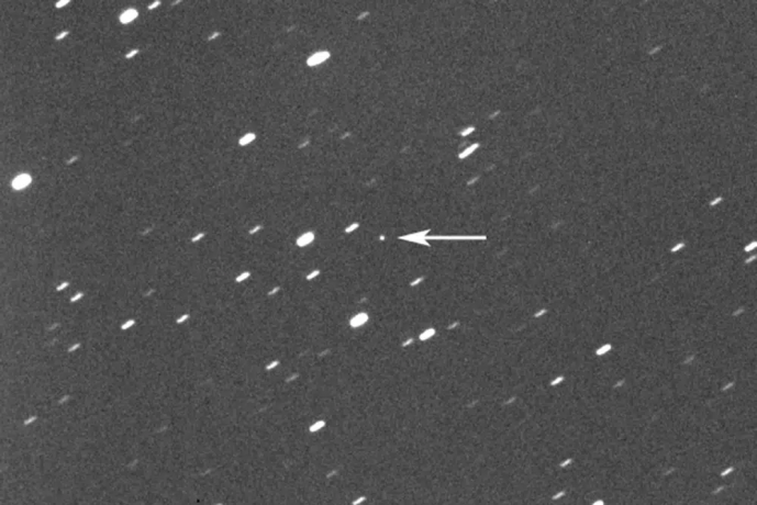 This photo provided by Gianluca Masi shows asteroid 2023 DZ2, indicated by arrow at center, about 1.8 million kilometers (1.1 million miles) away from the Earth on March 22, 2023.  AP/RSS Photo