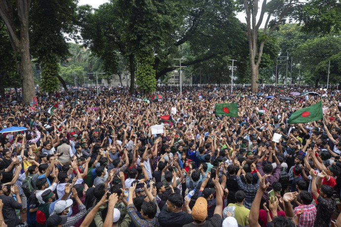 People participate in a protest march against Prime Minister Sheikh Hasina and her government, demanding justice for the victims killed in the recent countrywide deadly clashes, in Dhaka, Bangladesh, Saturday, Aug. 3, 2024. (AP Photo)