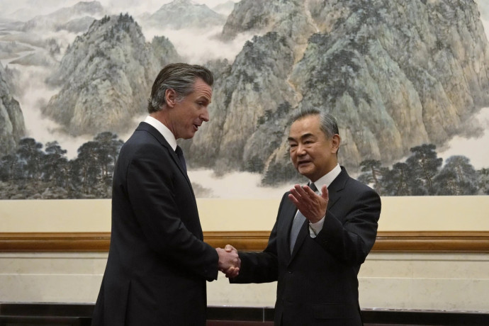 California Gov. Gavin Newsom, left, shakes hands with Chinese Foreign Minister Wang Yi during a meeting at the Diaoyutai State Guest House in Beijing, Wednesday, Oct. 25, 2023. (AP/RSS Photo)