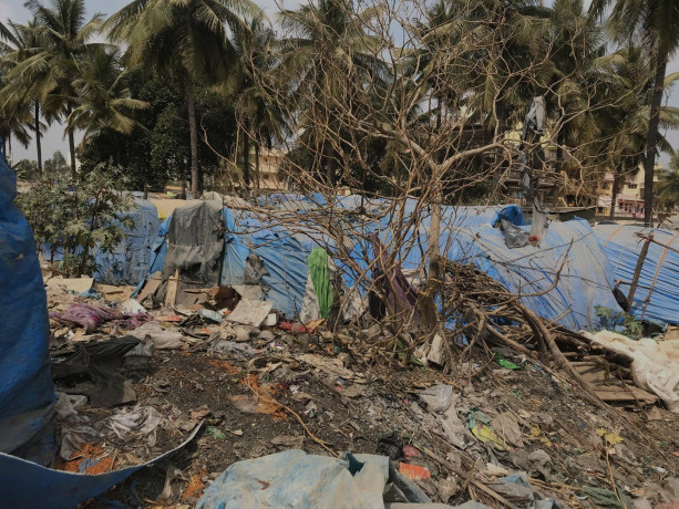 Crowded, unsanitary urban living conditions for migrant construction workers are associated with an increase in non-communicable diseases, including certain types of cancer. Photo: Abha Rao