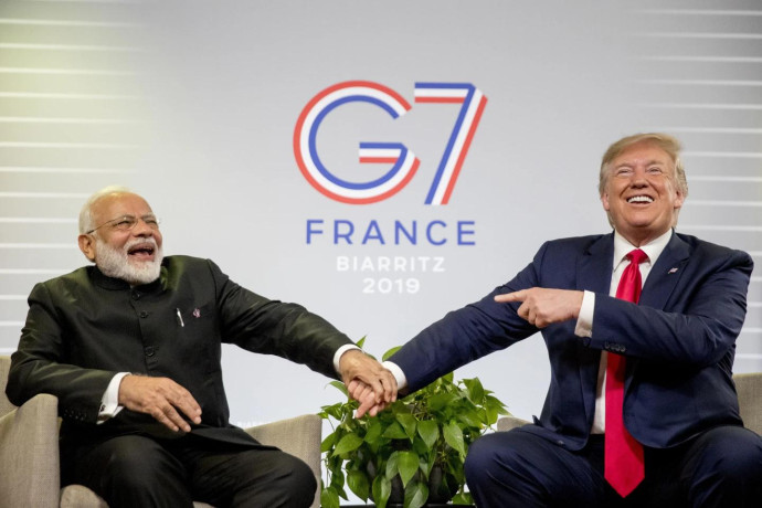 FILE- President Donald Trump and Indian Prime Minister Narendra Modi, left, share a laugh together during a bilateral meeting at the G-7 summit in Biarritz, France, Aug. 26, 2019. (AP Photo