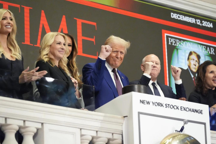 President-elect Donald Trump gestures after ringing the opening bell at the New York Stock Exchange, Thursday, Dec. 12, 2024, in New York. (AP Photo)