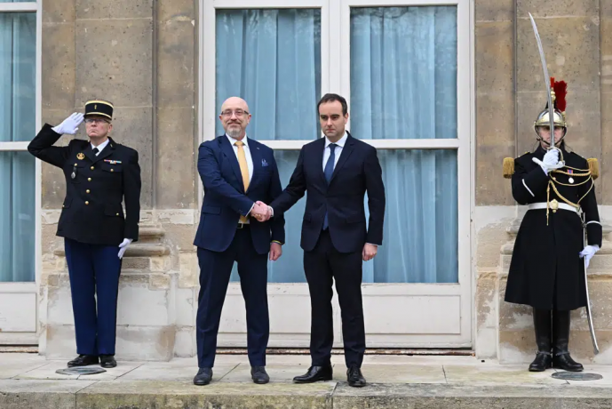 French Defense Minister Sebastien Lecornu, center right, and Ukrainian Minister of Defense Oleksii Reznikov pose during Reznikov's official visit at the French Defense Ministry, in Paris Tuesday, Jan. 31, 2023. AP/RSS Photo