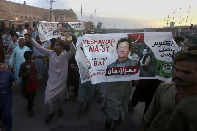 Supporters of Pakistan's former Prime Minister Imran Khan celebrate after Supreme Court decision, in Peshawar, Pakistan, Thursday, May 11, 2023. (AP/RSS Photo)