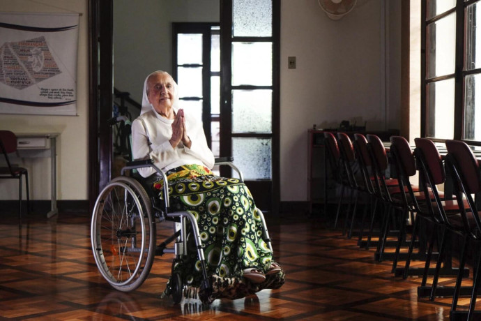 In this photo released by LongeviQuest, Sister Inah Canabarro, 115, puts her hands together in prayer, in Porto Alegre, Brazil, Friday, February 16, 2024. (AP)