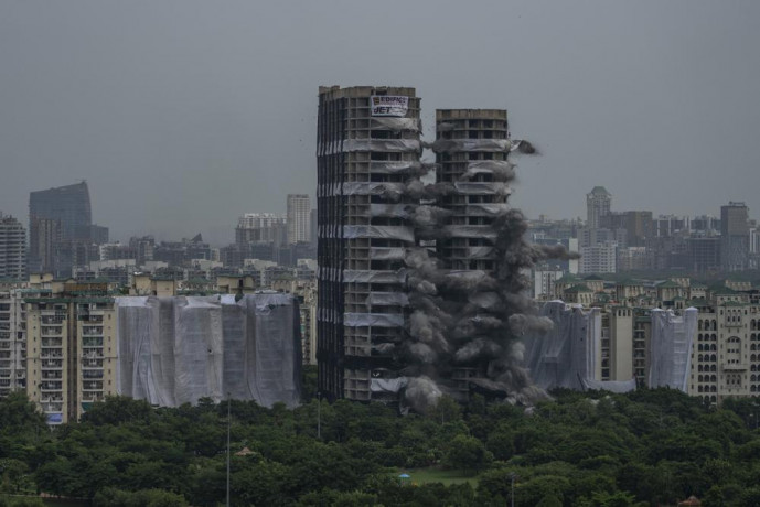 Explosives are detonated to demolish twin high-rise apartment towers in Noida, outskirts of New Delhi, India, Sunday, Aug. 28, 2022.  AP/RSS Photo
