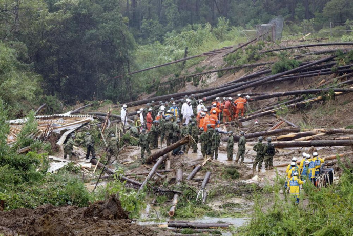 Rescuers conduct a search operation at the site of a landslide in Mimata, Miyazaki Prefecture, southern Japan, Monday Sept 19, 2022. Powerful Typhoon Nanmadol slammed ashore in southern Japan on Sunday as it pounded the region with strong winds and heavy rain, causing blackouts, paralyzing ground and air transportation and prompting the evacuation of thousands of people. (AP/RSS Photo)