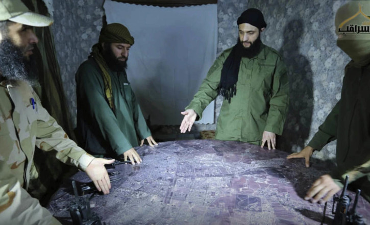 File Photo of Abu Mohammed al-Golani (second from R)