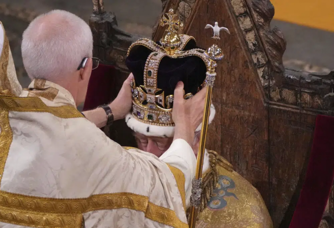 Britain's King Charles III is crowned with St Edward's Crown by The Archbishop of Canterbury Justin Welby during his coronation ceremony in Westminster Abbey, London, Saturday, May 6, 2023.  AP/RSS Photo