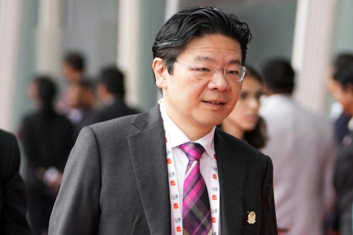 FILE - Singapore's Deputy Prime Minister and Finance Minister Lawrence Wong arrives to attend G-20's third Finance Ministers and Central Bank Governors (FMCBGs) meeting in Gandhinagar, India on July 17, 2023. (AP Photo)