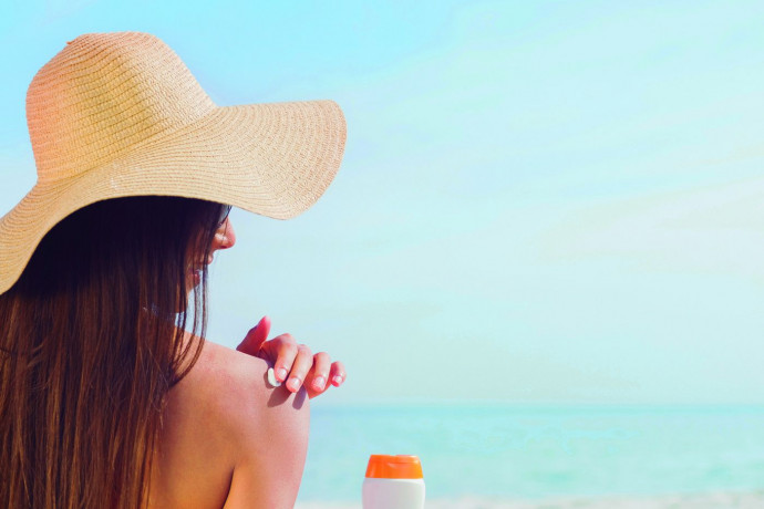 Sunscreen is a non-drug intervention that is safe and effective. (Wavebreak Media LTD)