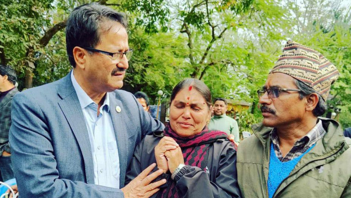 Foreign Minister NP Saud (left) with Bipin Joshi's parents. (Photo: Foreign Minister's Personal Secretariat)