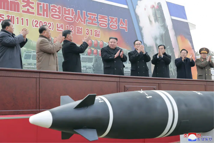 In this photo provided by the North Korean government, North Korean leader Kim Jong Un, center, attends a ceremony of donating 600mm super-large multiple launch rocket system at a garden of the Workers’ Party of Korea headquarters in Pyongyang, North Korea Saturday, Dec. 31, 2022. AP/RSS Photo