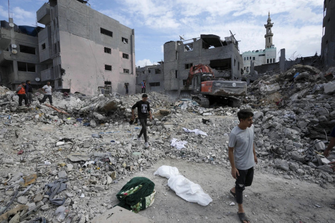 Palestinians recover the bodies of the al Meghari family killed in the Israeli bombardment of the Gaza Strip in Bureij refugee camp, Gaza Strip, Tuesday, Nov. 14, 2023. (AP/RSS Photo)