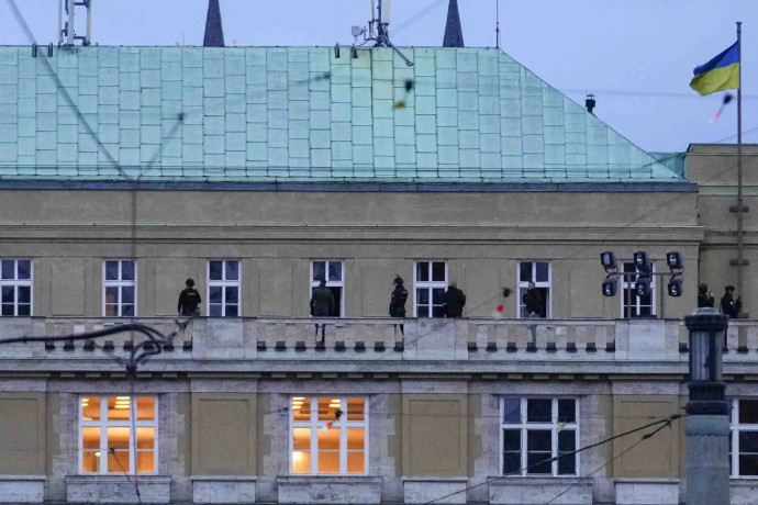 Police officers stand on the balcony of Philosophical Faculty of Charles University in downtown Prague, Czech Republic, Thursday, Dec. 21, 2023. (AP/RSS Photo)