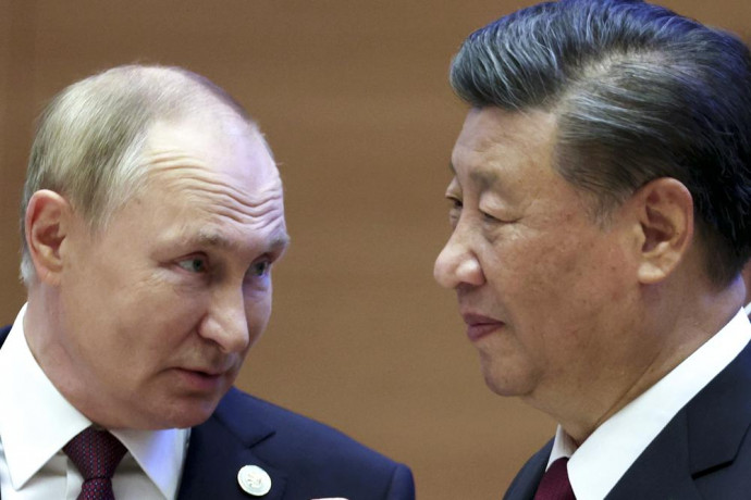 Russian President Vladimir Putin, left, speaks to Chinese President Xi Jinping during the Shanghai Cooperation Organization (SCO) summit in Samarkand, Uzbekistan, Friday, Sept. 16, 2022. AP/RSS Photo