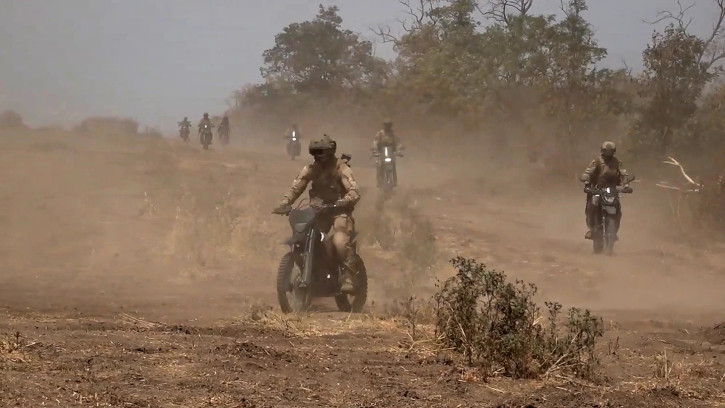 Russian marine assault team member on motorcycles.