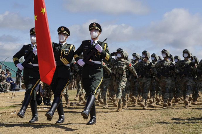 In this handout photo released by Russian Defense Ministry Press Service, Chinese troops march during the Vostok 2022 military exercise at a firing range in Russia's Far East, Wednesday, Aug. 31, 2022.  AP/RSS Photo