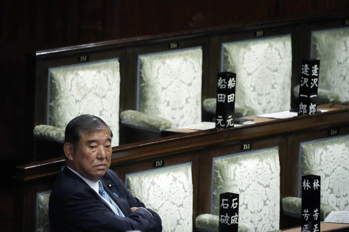 Japanese Prime Minister Shigeru Ishiba waits after the first vote for a new prime minister at a special parliamentary session of the lower house Monday, Nov. 11, 2024, in Tokyo. (AP Photo)