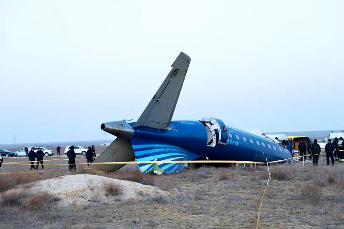 In this photo taken from a video released by the administration of Mangystau region, a part of Azerbaijan Airlines' Embraer 190 lies on the ground near the airport of Aktau, Kazakhstan, on Thursday, Dec. 26, 2024. (AP)