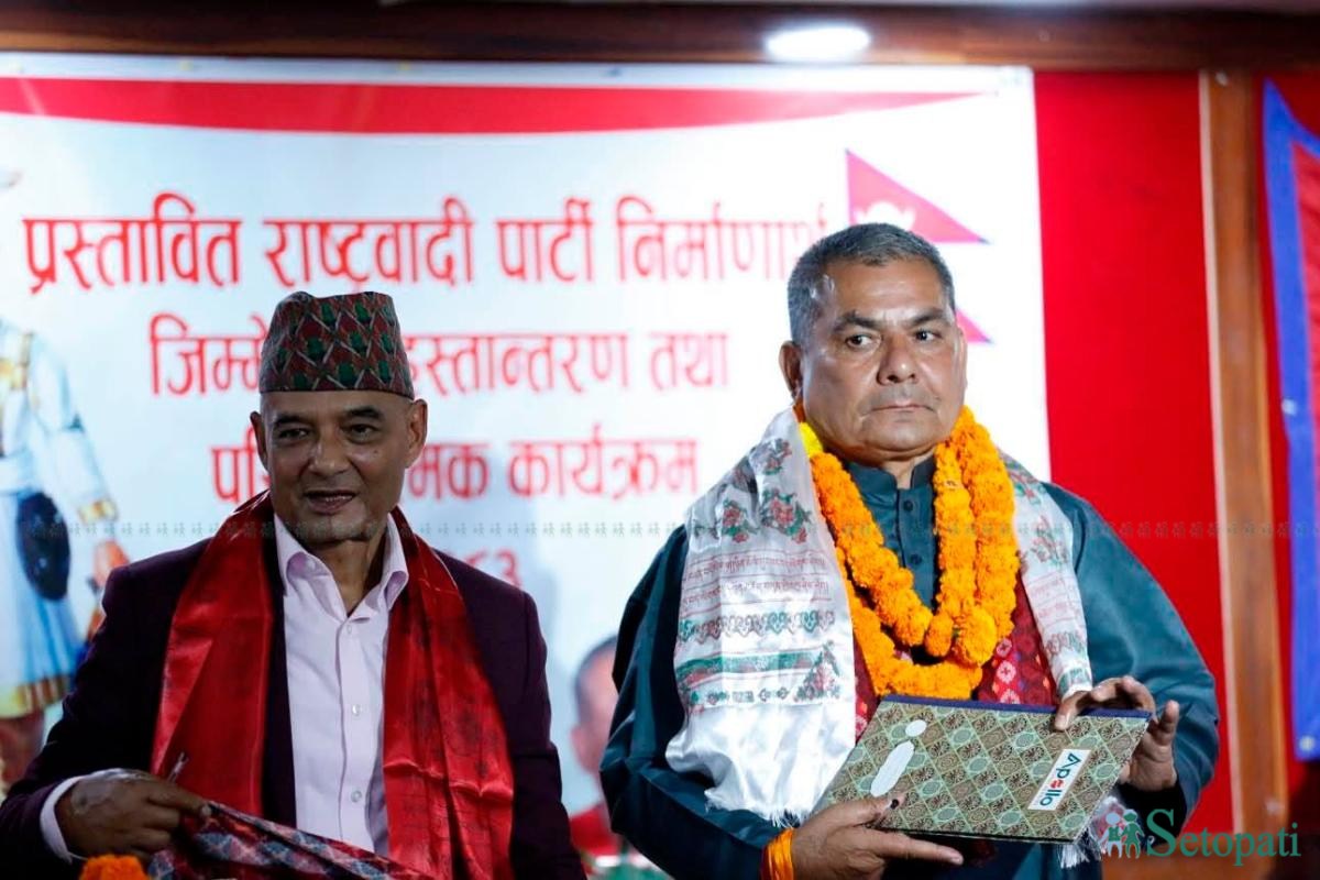 FILE - Dhawal Shumsher Rana (left) and Durga Prasai