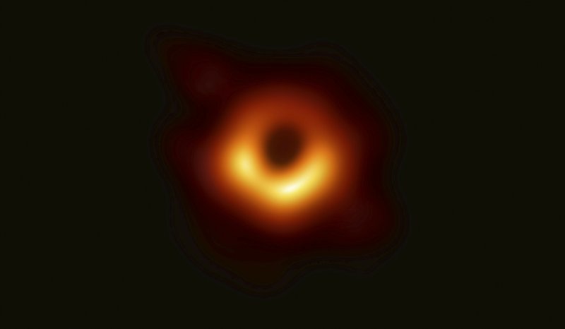 Scientists reveal first image of a black hole