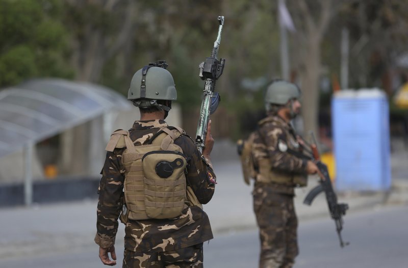 Afghan official says Taliban ambush police convoy, kill 9