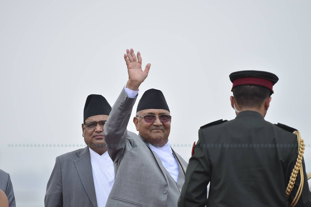 PM Oli leaves for India to attend Modi's swearing-in