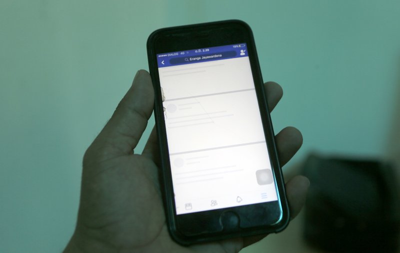 Sri Lanka imposes curfew, blocks social media after communal violence