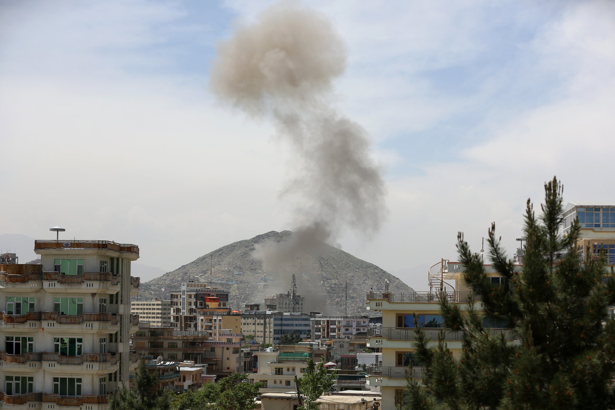 Taliban attack aid group office in Afghan capital, 9 wounded