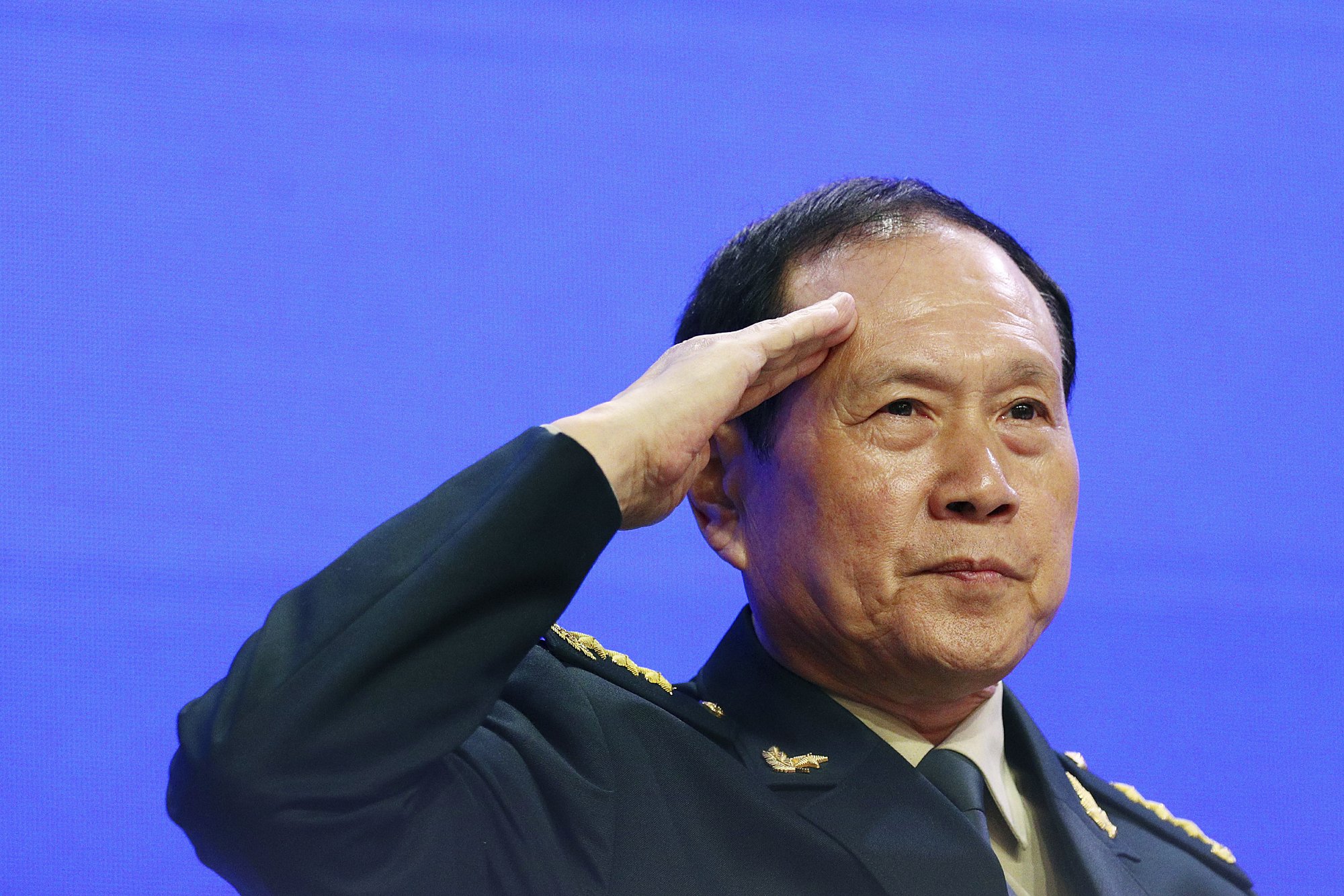 China vows military action to defend its claims over Taiwan, sea