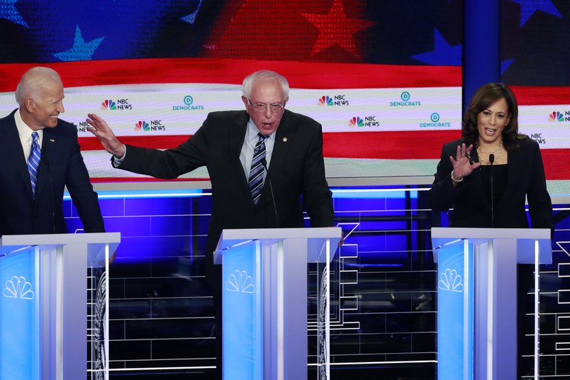 Rivals target Biden as Democrats' rifts emerge on race, age
