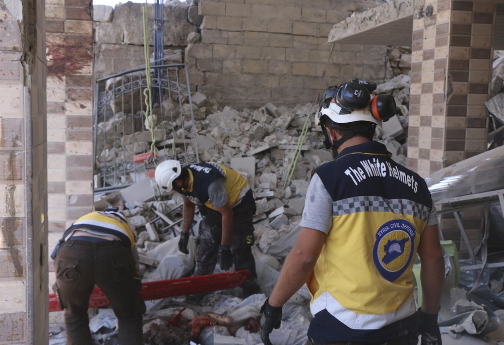 Syrian activists say airstrike killed 23 in rebel-held town